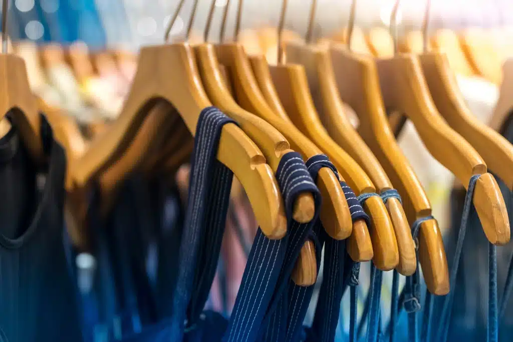 Women clothes on hangers shopping addiction detox rehab