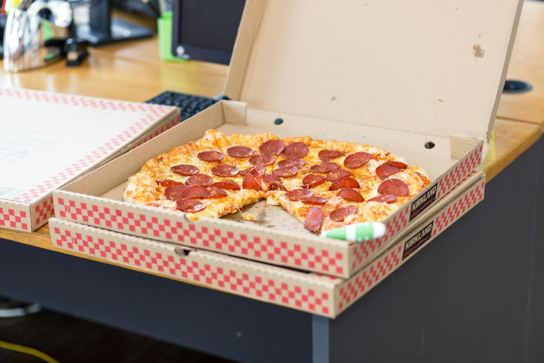 pizza with box on table weight loss injection addiction