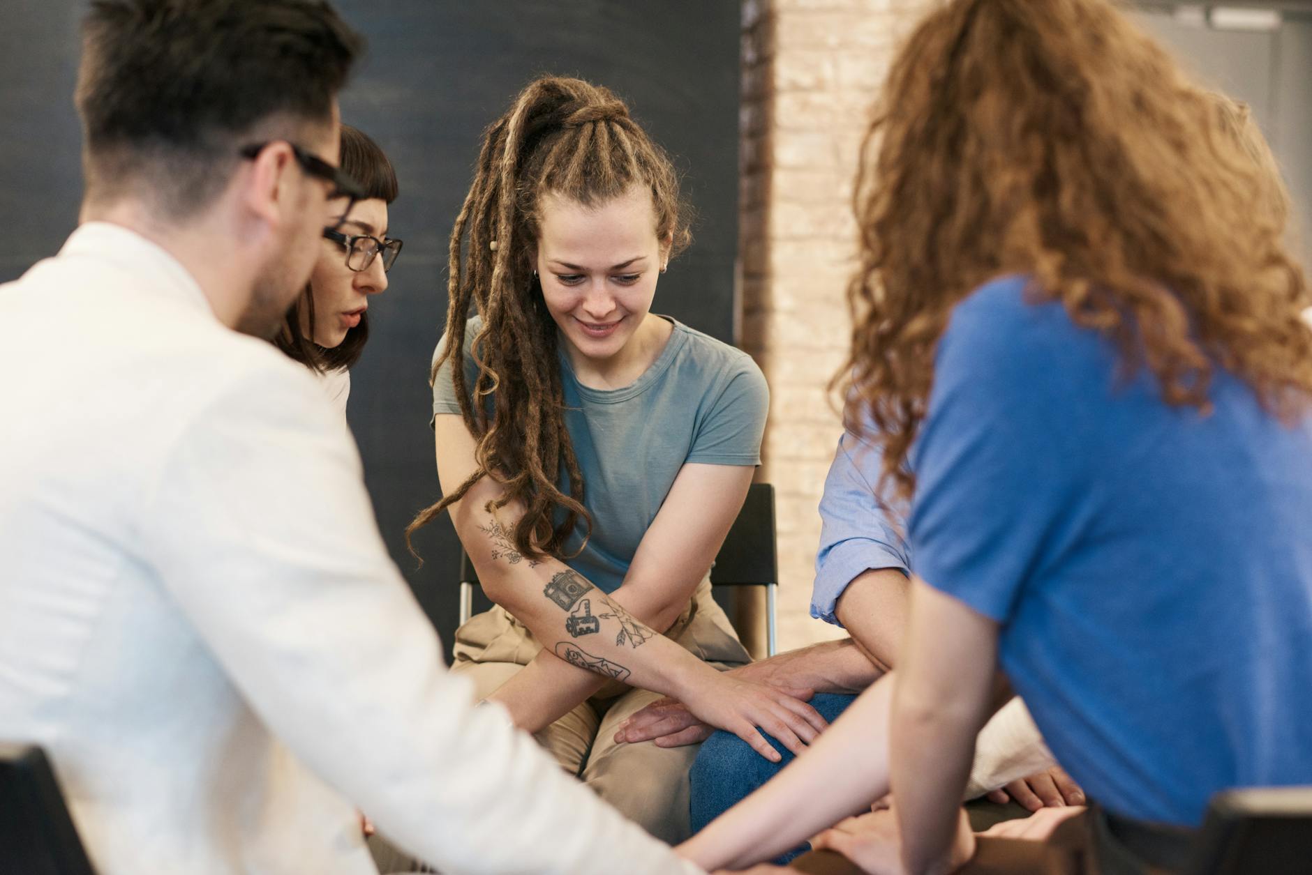 photo of people holding hands Relapse prevention aftercare strategies