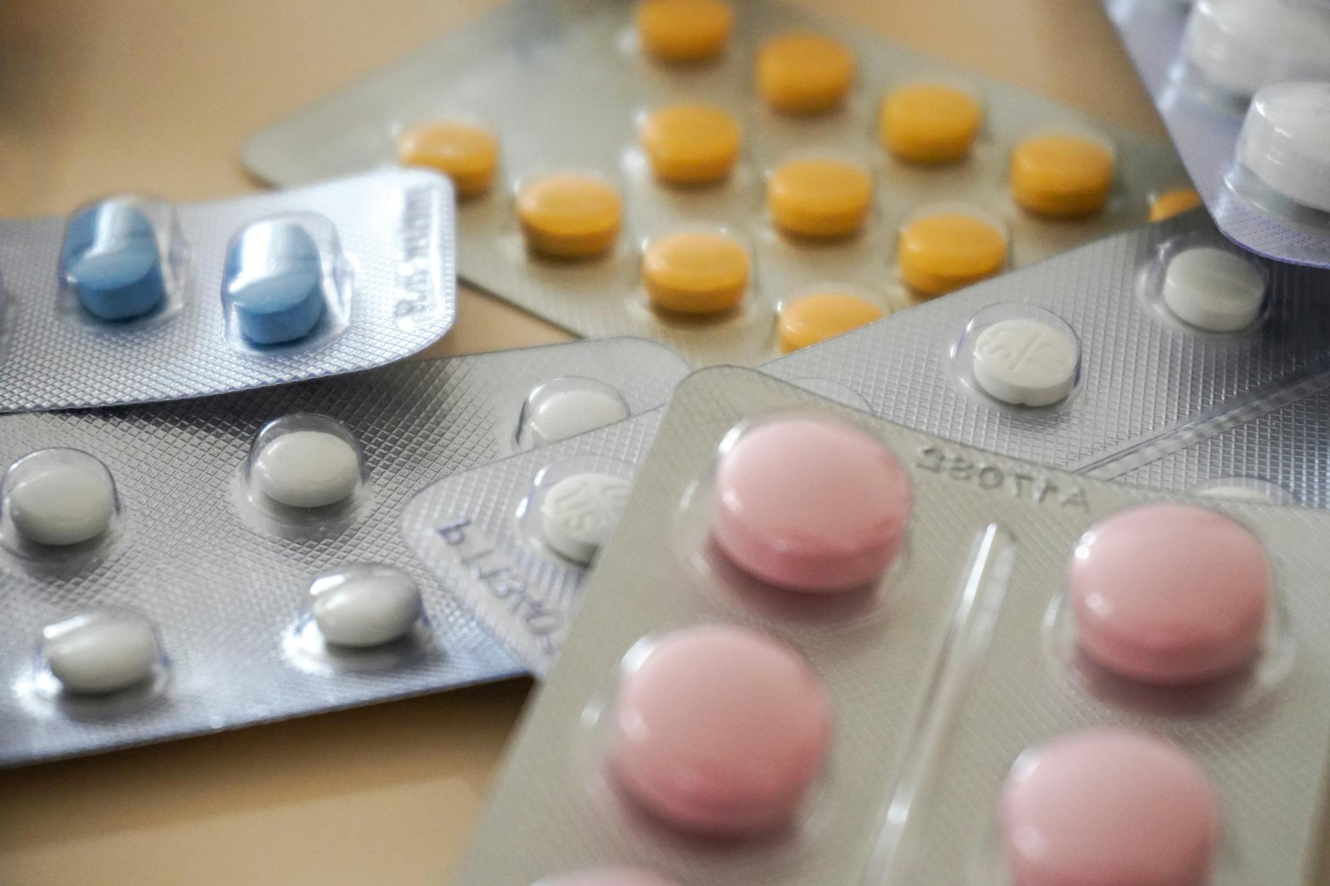 assorted medication blisters close up Addiction referral agents sell