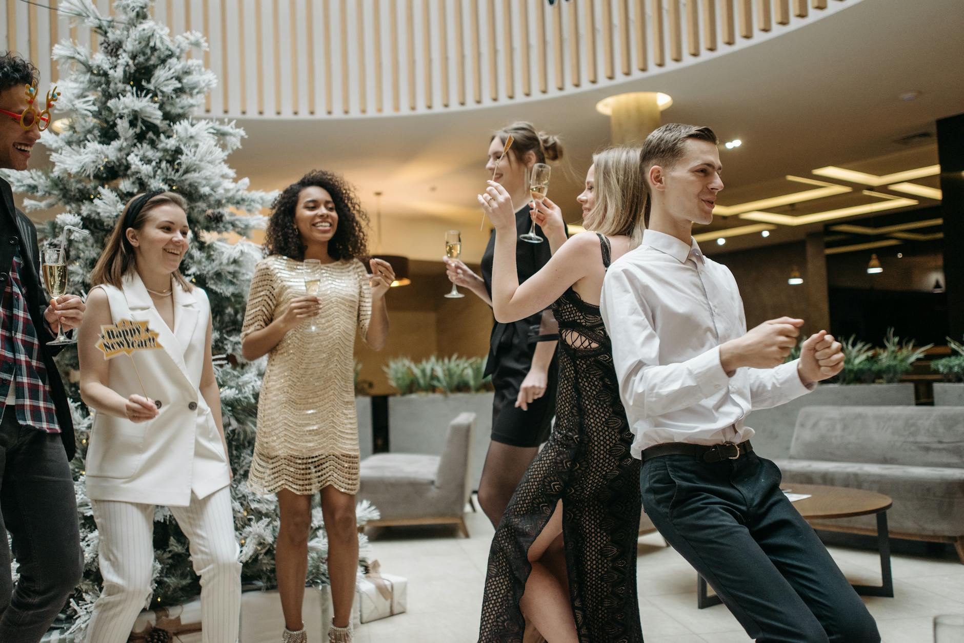 men and women dancing together Staying Sober at Social events