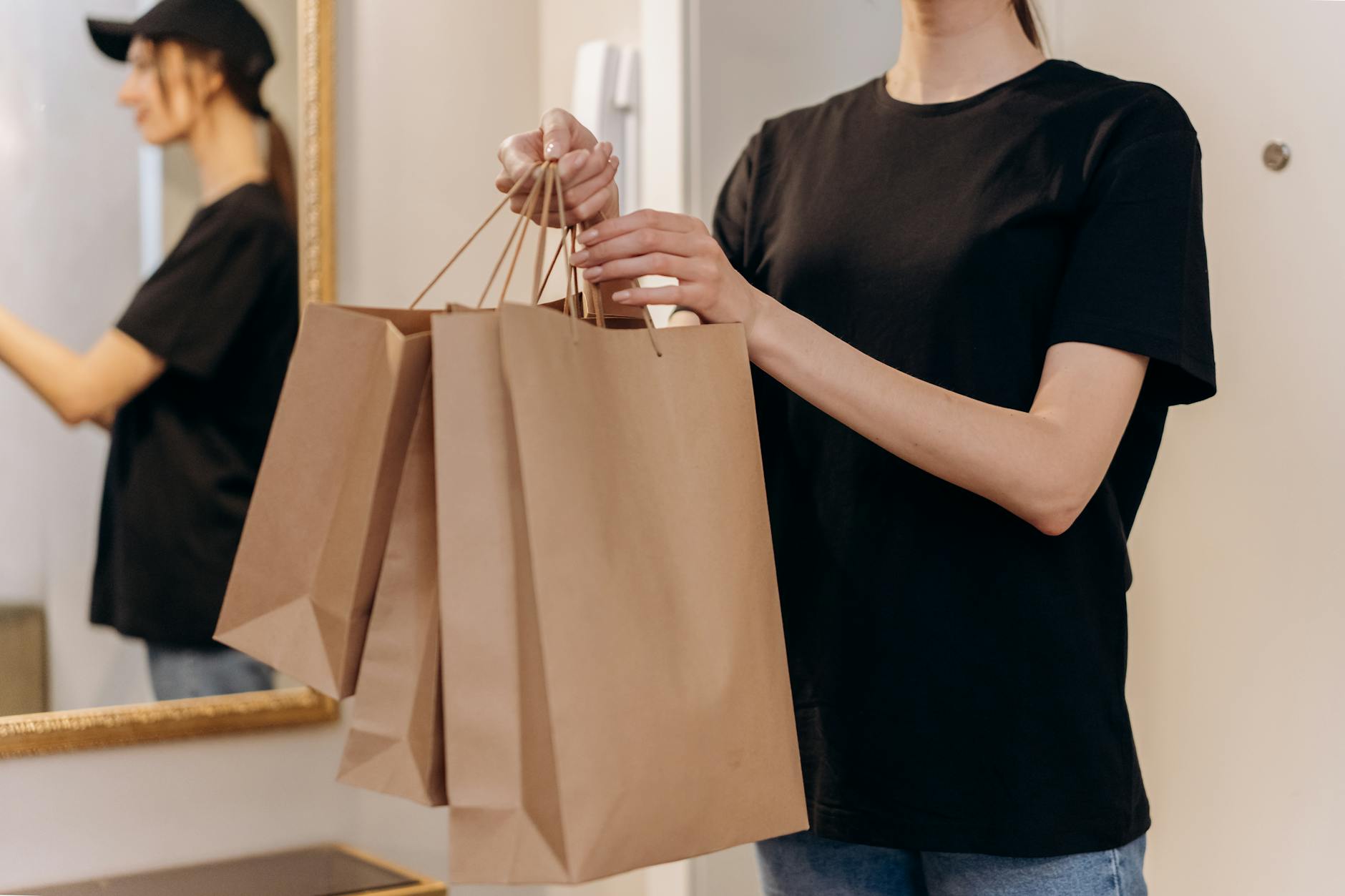 a close up shot of a woman holding paperbags shopping addiction detox rehab