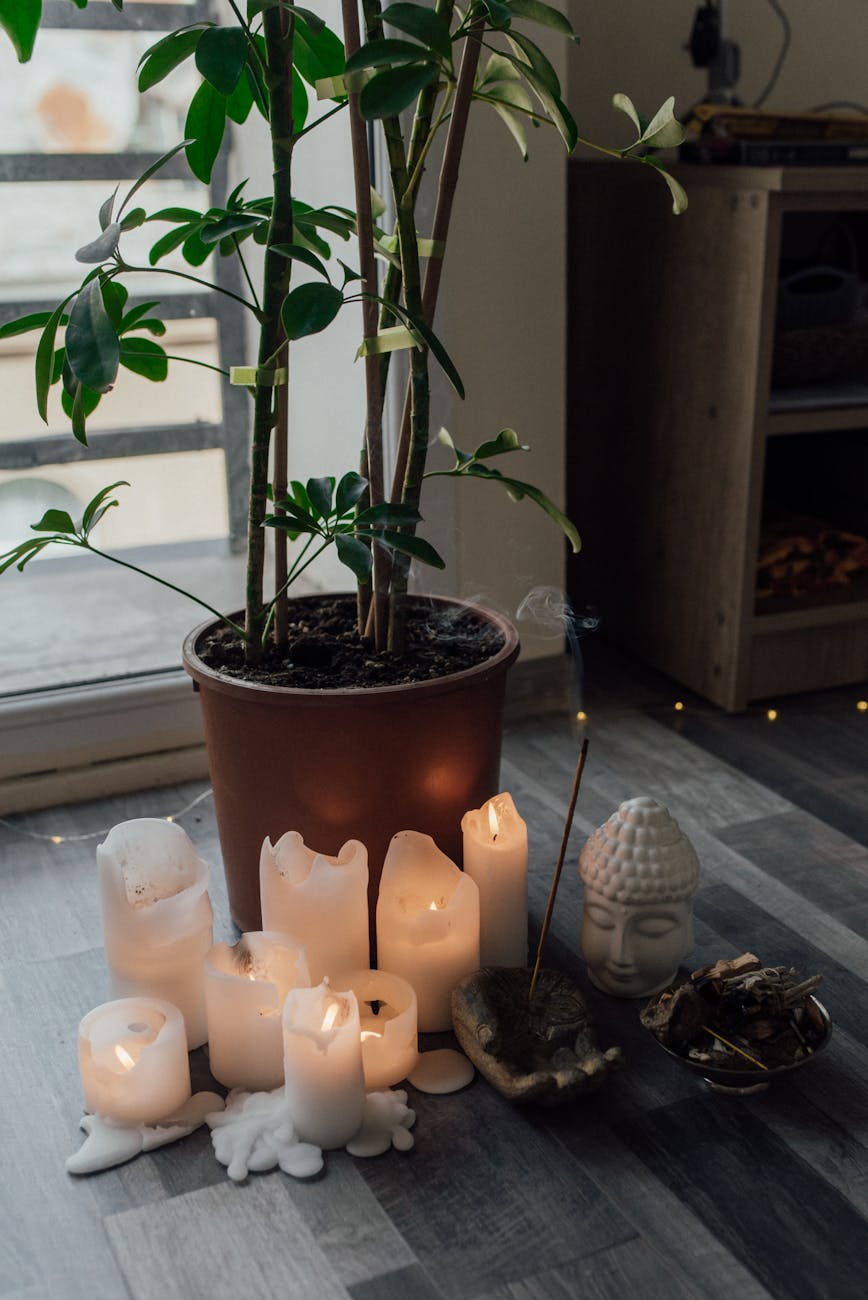 lighted candles beside a smoking incense Alcohol and drug home detox