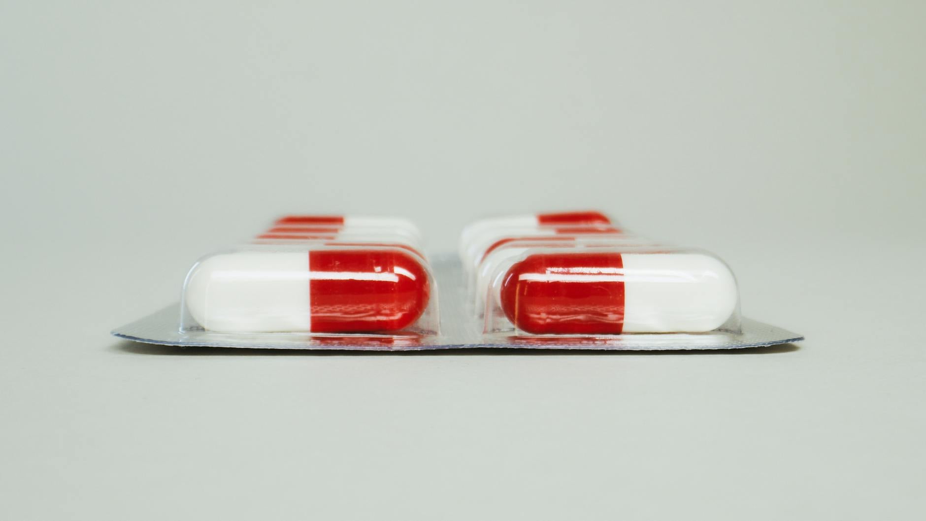 red and white medicine capsules https://findmearehab.net/contact-support/