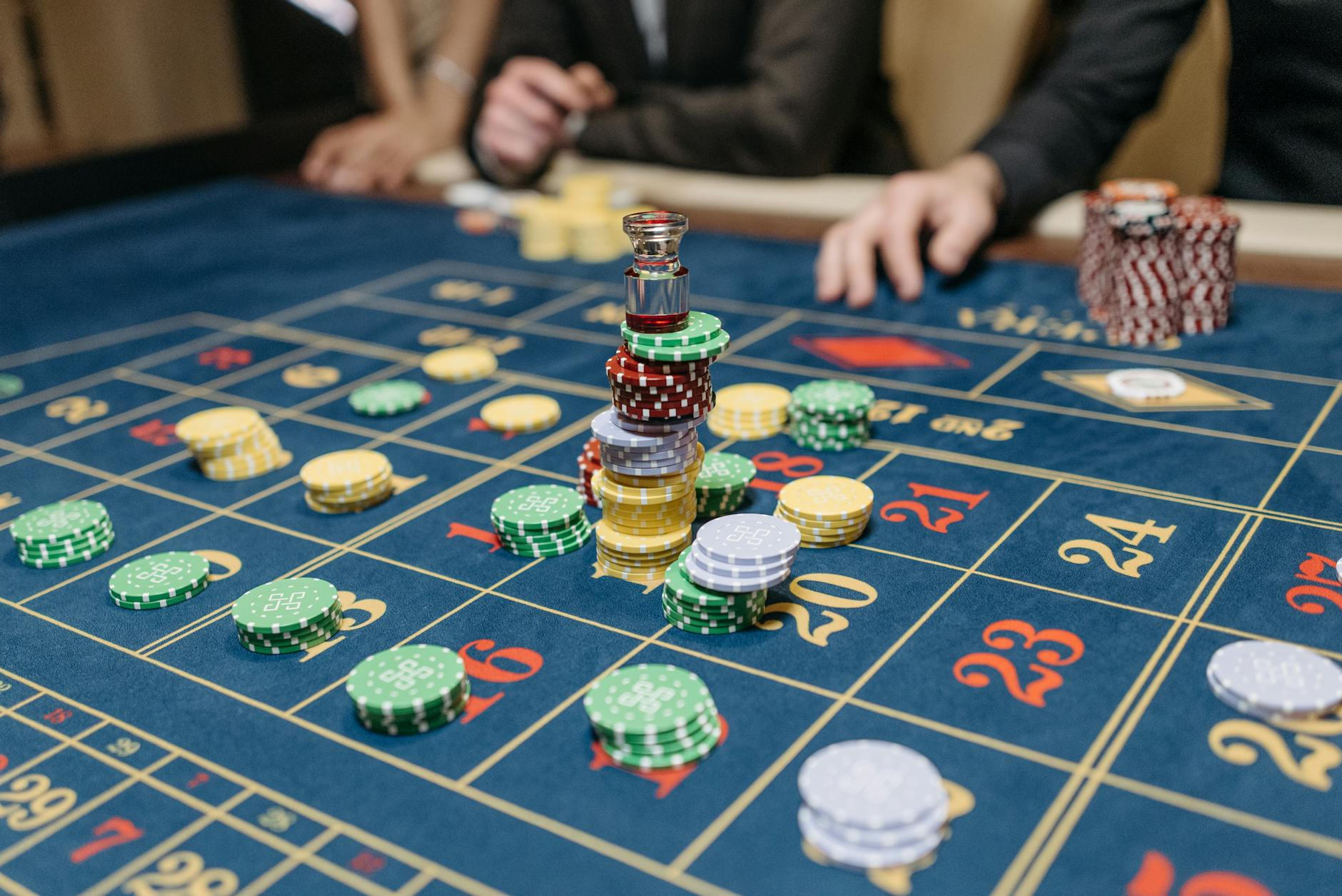 stacks of casino chips on gaming table help for gambling addiction detox rehab